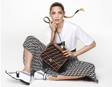 New hit of the season: white sneakers with a logo detail